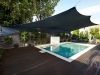 Swimming pool shade sail