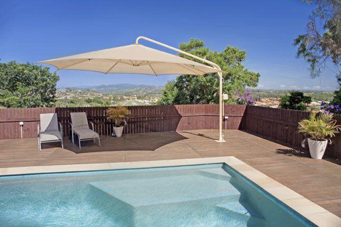 Cantilever umbrellas – offering the perfect pool shade Cantilever umbrellas – offering the perfect pool shade
